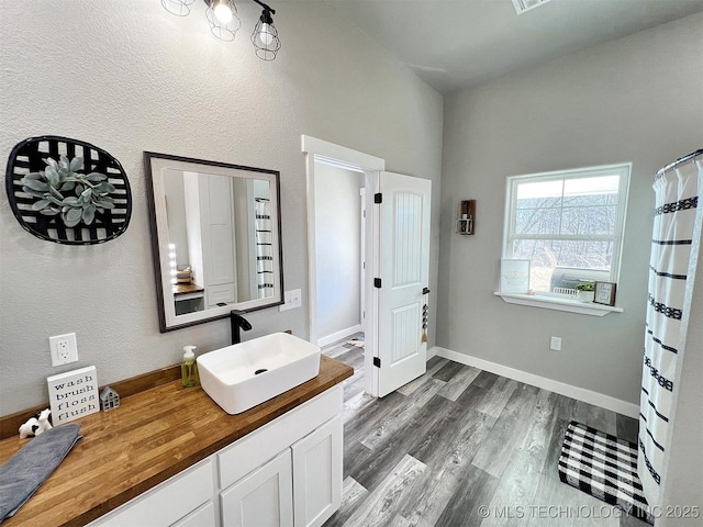 11457 N 510th Rd, Tahlequah, OK 74464 - full bath featuring wood finished floors and vanity
