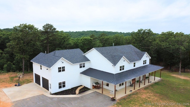 11457 N 510th Rd, Tahlequah, OK 74464 - view from above of property with a heavily wooded area