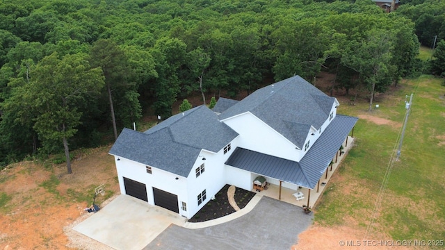 11457 N 510th Rd, Tahlequah, OK 74464 - aerial view of property and surrounding area with a heavily wooded area