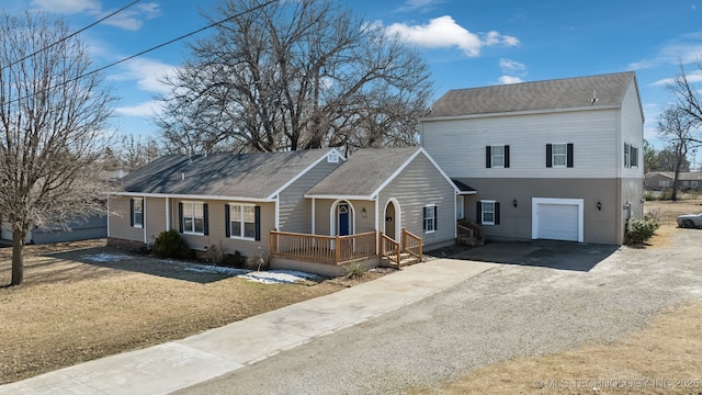 view of front of home with driveway and an attached garage