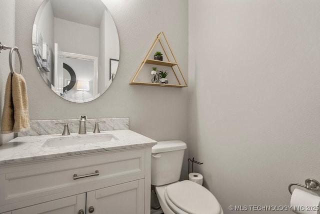 half bath with toilet and vanity