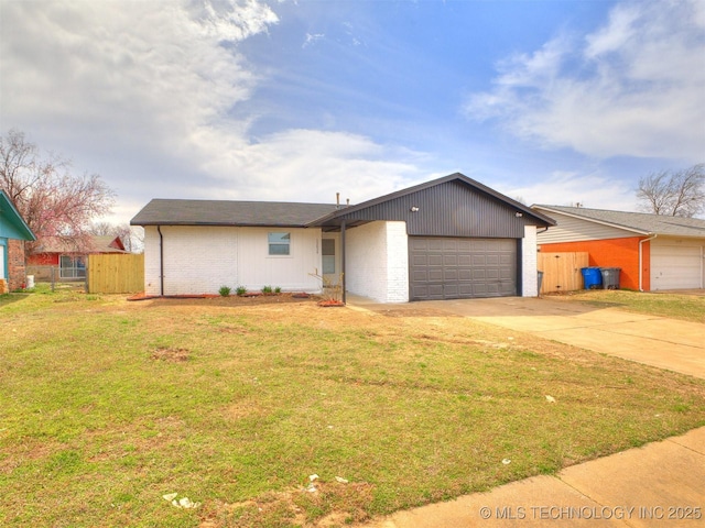 view of front facade with a garage, brick siding, concrete driveway, and fence