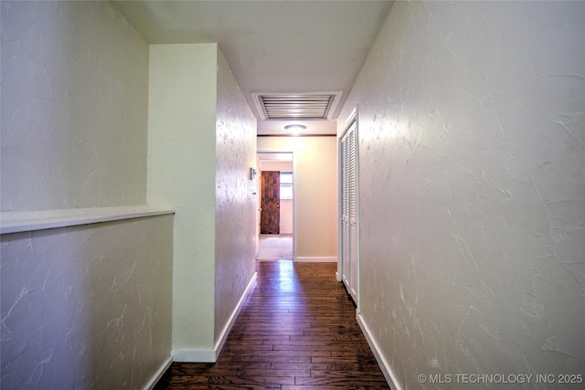 6508 W Cameron St, Sand Springs, OK 74127 - hallway featuring visible vents, a textured wall, and wood-type flooring