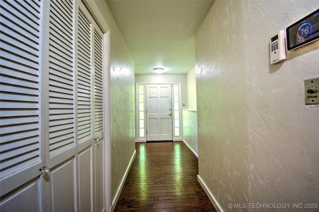 6508 W Cameron St, Sand Springs, OK 74127 - corridor with dark wood finished floors, baseboards, and a textured wall