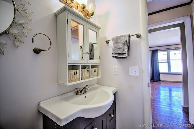 6508 W Cameron St, Sand Springs, OK 74127 - bathroom with vanity and wood finished floors