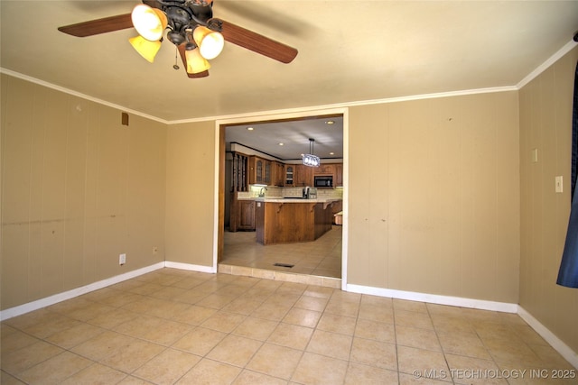 6508 W Cameron St, Sand Springs, OK 74127 - unfurnished living room featuring light tile patterned floors, baseboards, ceiling fan, and crown molding