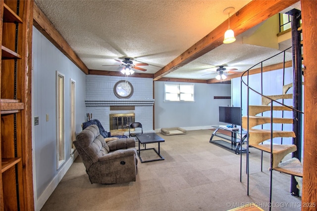 6508 W Cameron St, Sand Springs, OK 74127 - living room featuring stairway, beamed ceiling, a ceiling fan, and a textured ceiling