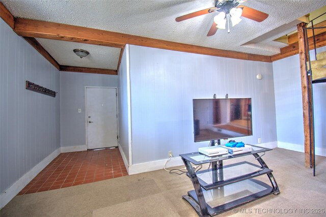 6508 W Cameron St, Sand Springs, OK 74127 - interior space featuring beam ceiling, a textured ceiling, tile patterned flooring, baseboards, and ceiling fan