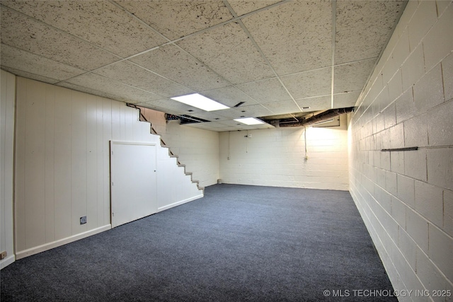 6508 W Cameron St, Sand Springs, OK 74127 - finished below grade area with stairs, concrete block wall, and dark colored carpet
