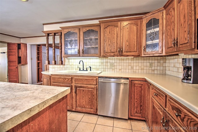 6508 W Cameron St, Sand Springs, OK 74127 - kitchen with stainless steel dishwasher, light countertops, tasteful backsplash, and a sink