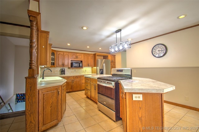 6508 W Cameron St, Sand Springs, OK 74127 - kitchen featuring tasteful backsplash, light countertops, brown cabinets, stainless steel appliances, and a sink
