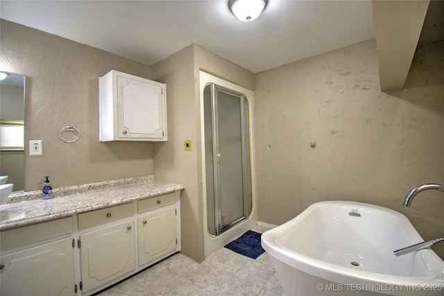 6508 W Cameron St, Sand Springs, OK 74127 - full bath with vanity, a shower stall, and a freestanding tub