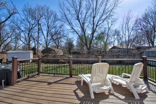 6508 W Cameron St, Sand Springs, OK 74127 - deck featuring a grill, a storage unit, an outdoor structure, and fence