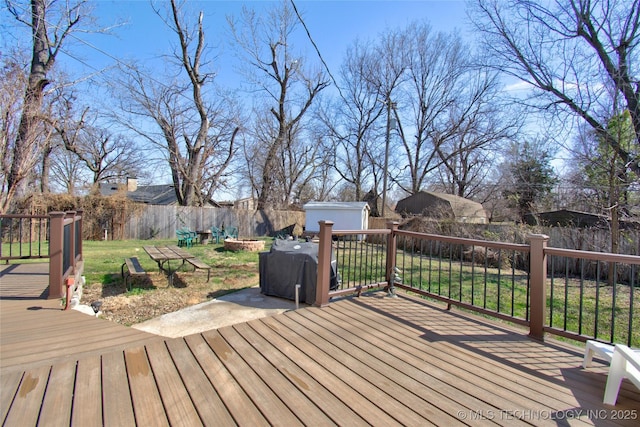 6508 W Cameron St, Sand Springs, OK 74127 - wooden deck featuring an outbuilding, a shed, and a yard