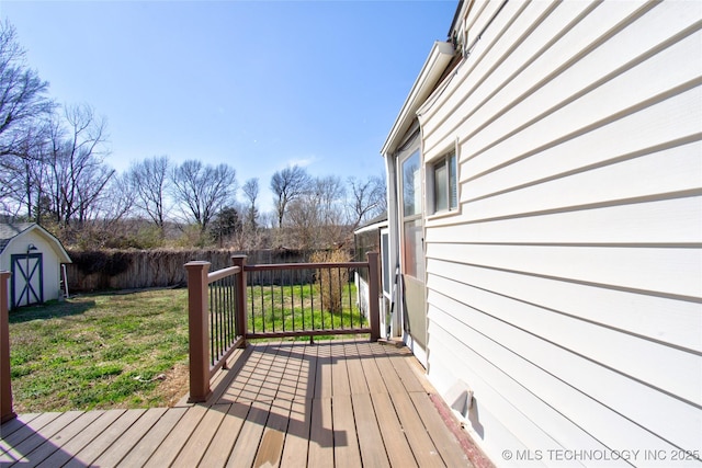 6508 W Cameron St, Sand Springs, OK 74127 - wooden deck with fence, an outbuilding, a lawn, and a shed