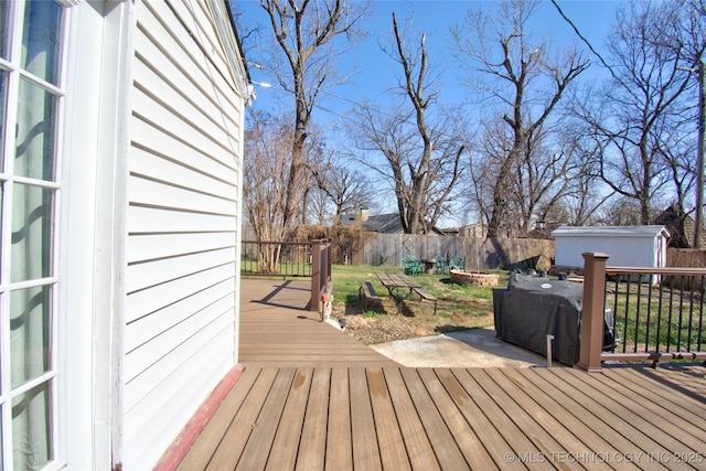 6508 W Cameron St, Sand Springs, OK 74127 - deck featuring a lawn, a storage shed, an outdoor structure, and fence