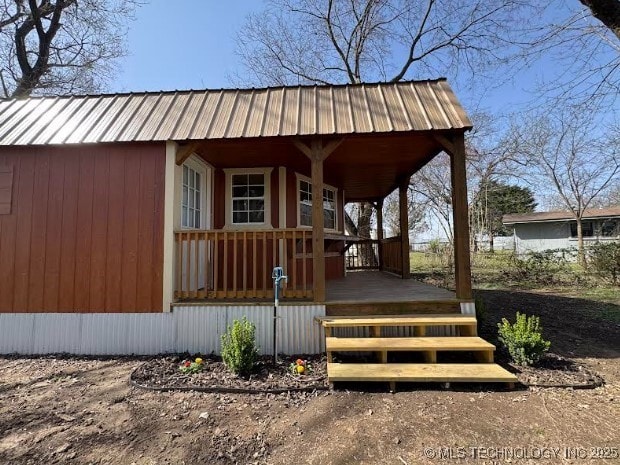 exterior space featuring covered porch