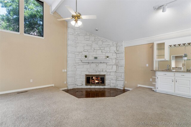 6505 S Oswego Ave, Tulsa, OK 74136 - unfurnished living room with a fireplace, baseboards, visible vents, ceiling fan, and carpet