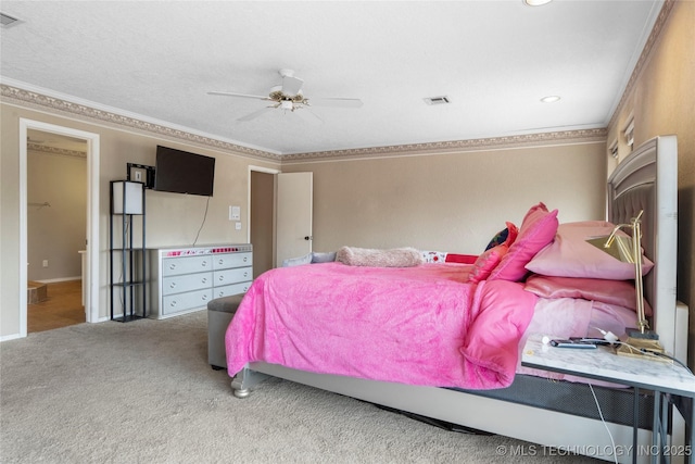 6505 S Oswego Ave, Tulsa, OK 74136 - bedroom with carpet floors, ornamental molding, ceiling fan, and visible vents