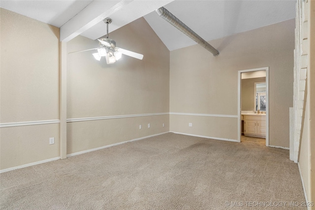 6505 S Oswego Ave, Tulsa, OK 74136 - unfurnished room with baseboards, vaulted ceiling with beams, carpet, and ceiling fan