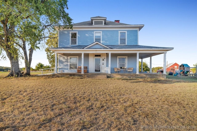 5174 Silo Rd, Durant, OK 74701 - view of front of home with a front lawn and covered porch