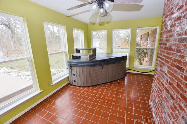 1430 Williams St, Fort Gibson, OK 74434 - sunroom / solarium with plenty of natural light, a hot tub, and ceiling fan