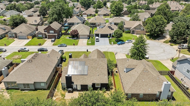birds eye view of property with a residential view