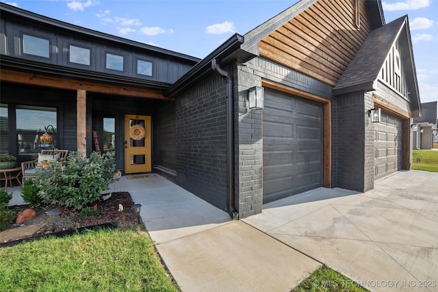 view of front of home featuring driveway, covered porch, brick siding, and a garage