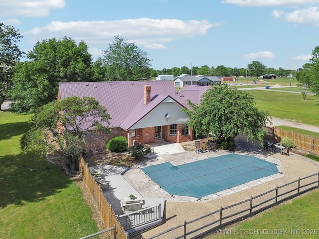 11712 E 121st St, Collinsville, OK 74021 - view of swimming pool featuring a patio