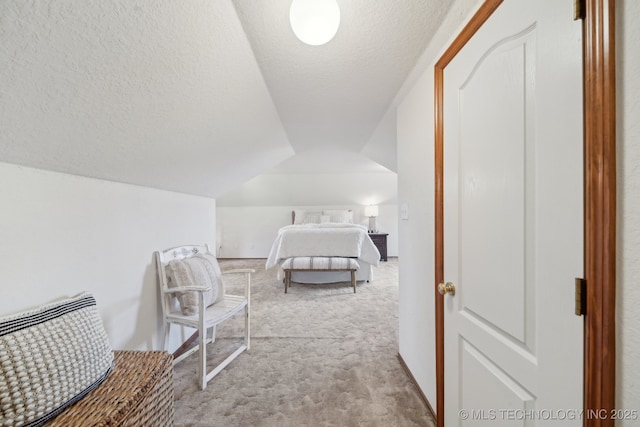 11712 E 121st St, Collinsville, OK 74021 - bedroom featuring carpet flooring, a textured ceiling, and lofted ceiling