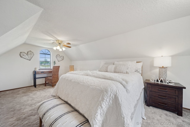 11712 E 121st St, Collinsville, OK 74021 - bedroom featuring light carpet, lofted ceiling, a ceiling fan, a textured ceiling, and baseboards