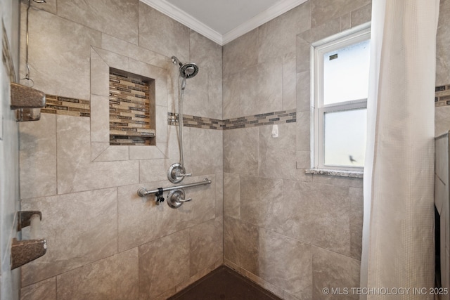 bathroom with a tile shower and ornamental molding