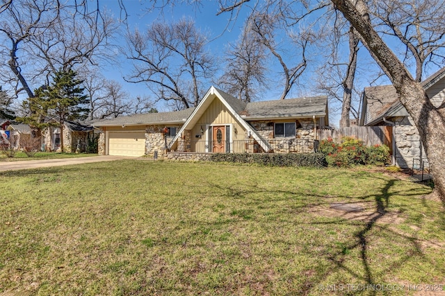 a-frame style home with driveway, a front lawn, a garage, stone siding, and board and batten siding