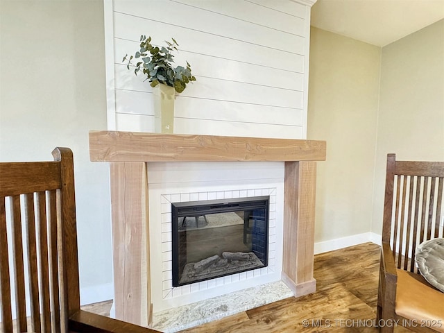 17022 S 579th Rd, Tahlequah, OK 74464 - detailed view of wood finished floors and a glass covered fireplace