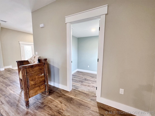 17022 S 579th Rd, Tahlequah, OK 74464 - corridor featuring wood finished floors and baseboards