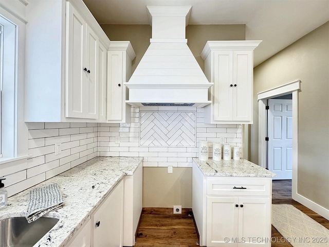 17022 S 579th Rd, Tahlequah, OK 74464 - kitchen featuring premium range hood, white cabinets, and light stone countertops