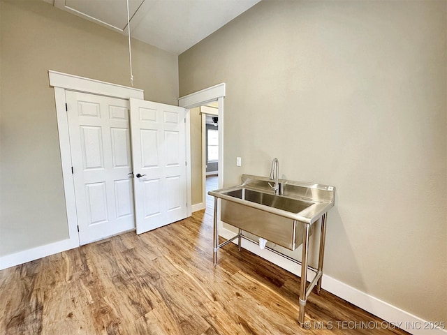 17022 S 579th Rd, Tahlequah, OK 74464 - bedroom with light wood-type flooring, attic access, and high vaulted ceiling