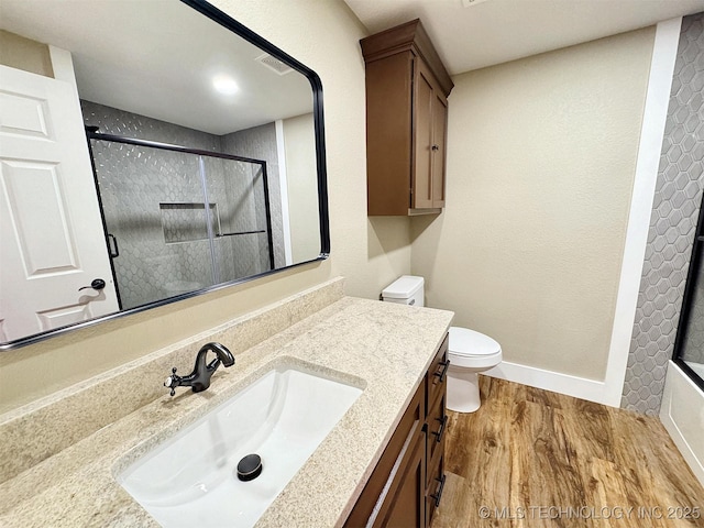 17022 S 579th Rd, Tahlequah, OK 74464 - full bath with a shower with door, vanity, and wood finished floors