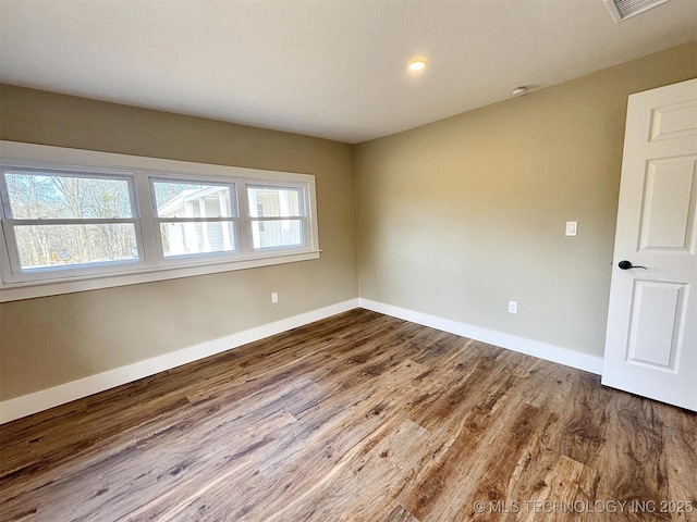 17022 S 579th Rd, Tahlequah, OK 74464 - unfurnished room featuring wood finished floors and recessed lighting