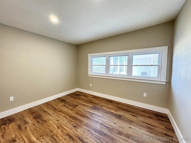 17022 S 579th Rd, Tahlequah, OK 74464 - unfurnished room featuring dark wood-style floors