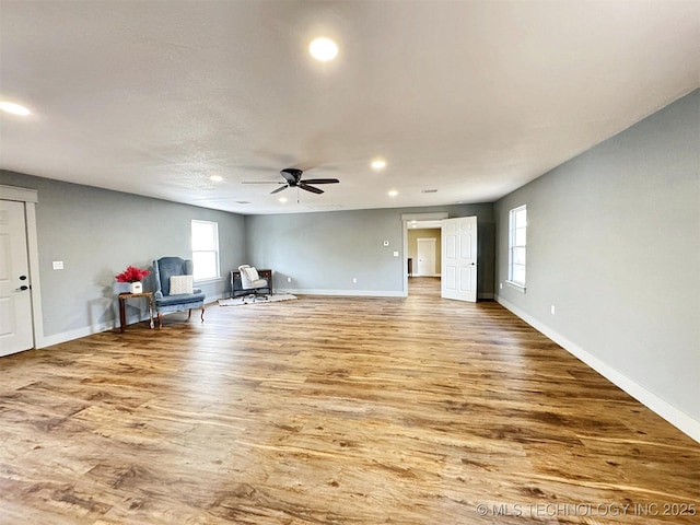 17022 S 579th Rd, Tahlequah, OK 74464 - sitting room with wood finished floors, recessed lighting, a ceiling fan, and healthy amount of natural light