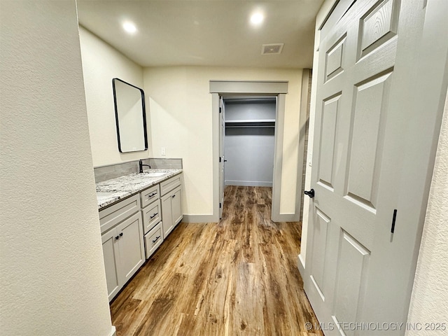 17022 S 579th Rd, Tahlequah, OK 74464 - bathroom featuring wood finished floors and vanity