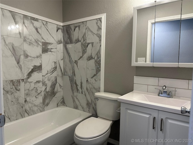 full bathroom featuring vanity, shower / washtub combination, toilet, a textured wall, and tasteful backsplash