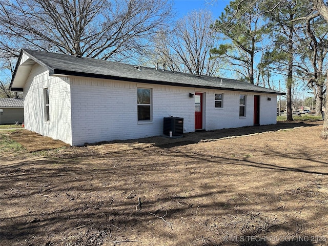 view of outbuilding featuring central AC unit