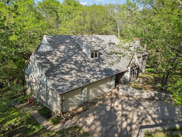 exterior space with a forest view