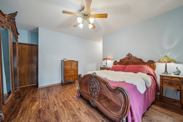bedroom with ceiling fan and wood finished floors
