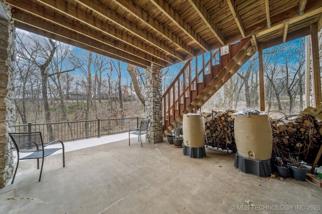 view of patio with stairway