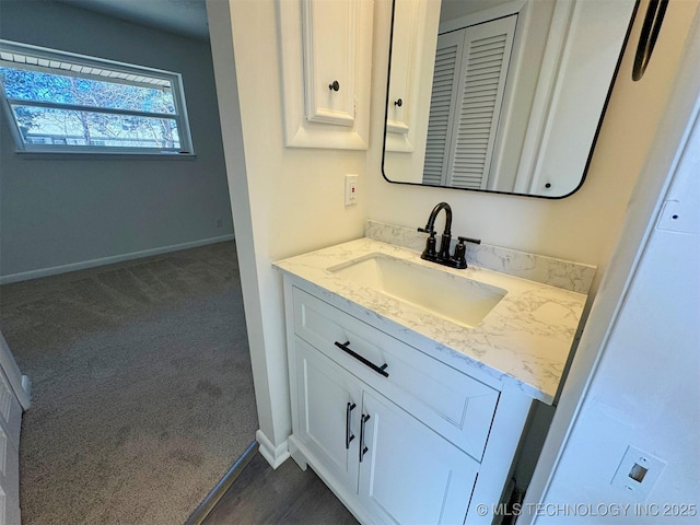 4760 S Irvington Ave, Tulsa, OK 74135 - bathroom featuring vanity and baseboards