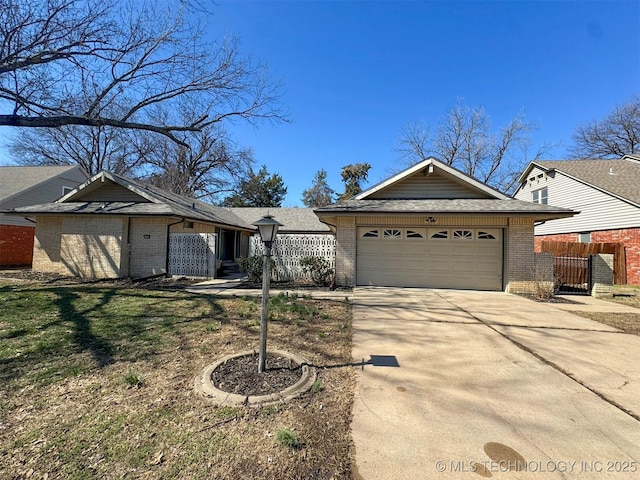 4760 S Irvington Ave, Tulsa, OK 74135 - single story home with fence, brick siding, and driveway