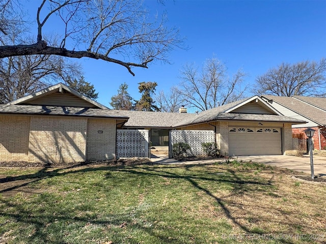 4760 S Irvington Ave, Tulsa, OK 74135 - ranch-style home with a front lawn, concrete driveway, a garage, brick siding, and a chimney